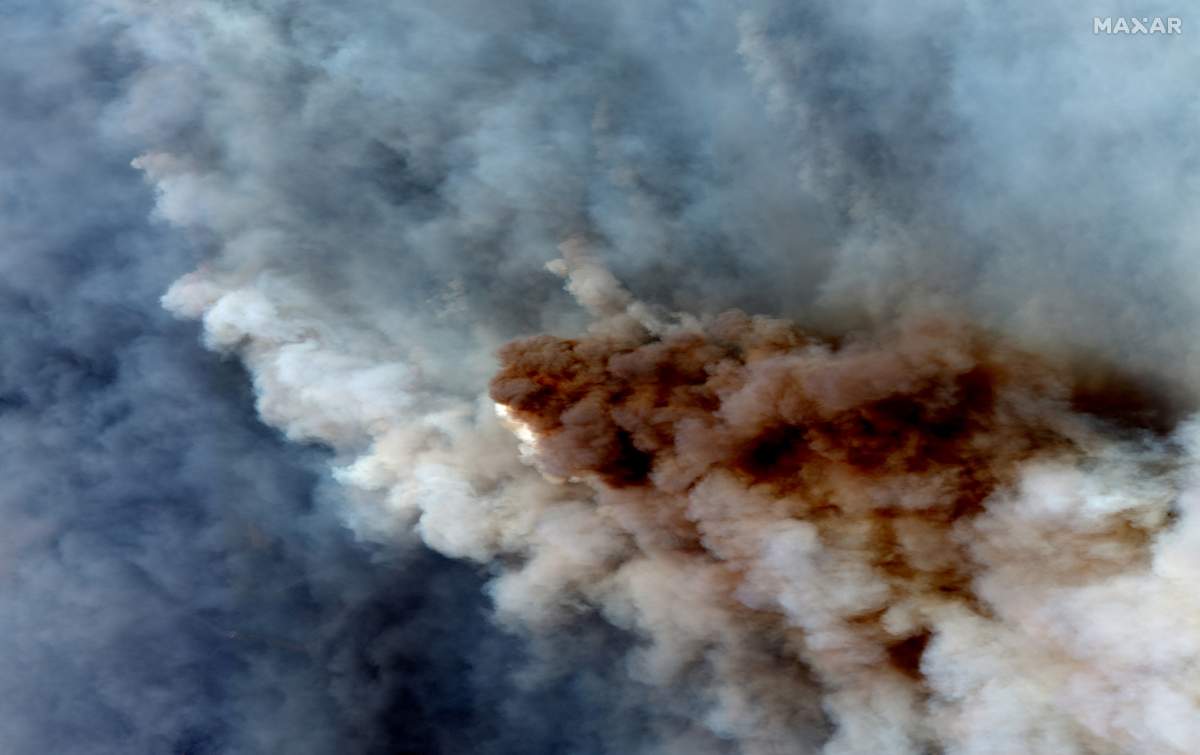 A natural colour satellite image shows smoke from wildfires burning east of Orbost, Victoria, Australia on Jan. 4, 2020.
