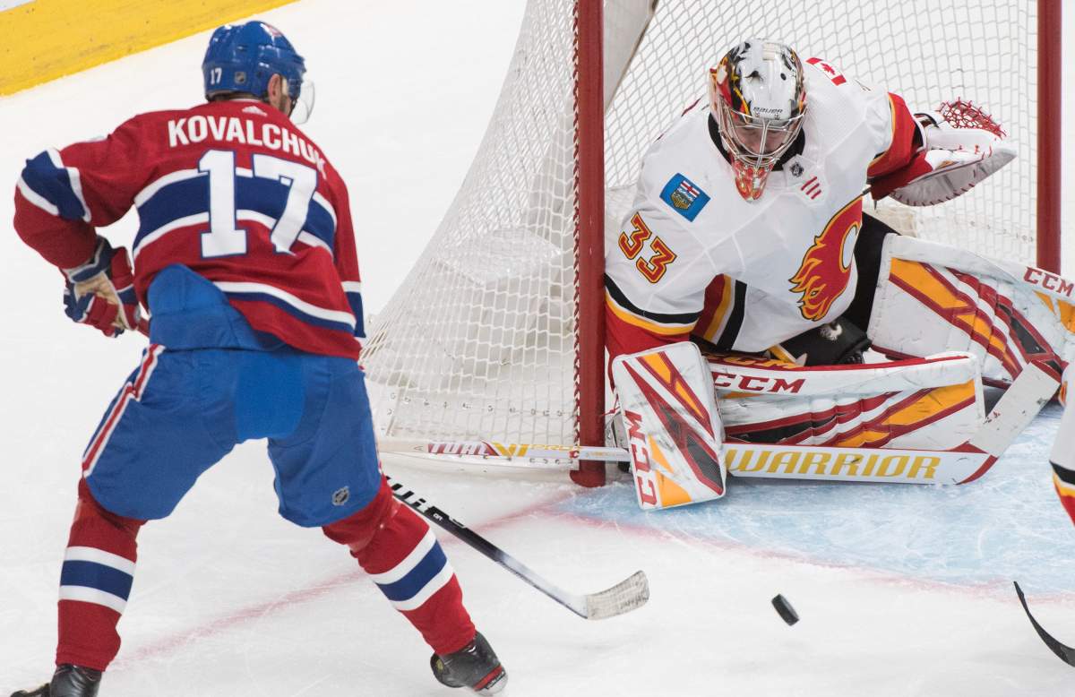 Montreal Canadiens' Ilya Kovalchuk moves in on Calgary Flames goaltender David Rittich during first period NHL hockey action in Montreal on Monday, January 13, 2020. 
