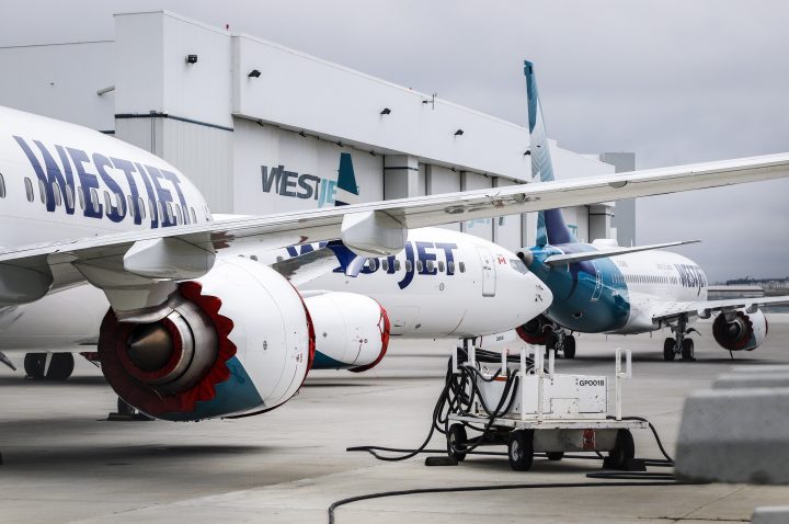 Grounded WestJet Boeing 737 Max aircraft are shown at the airline's facilities in Calgary, Alta., Tuesday, May 7, 2019. WestJet Airlines Ltd. says is removing Boeing's grounded 737 Max jet from flight schedules through June 24 following the manufacturer's latest guidance about regulatory approval for the plane to fly again. 