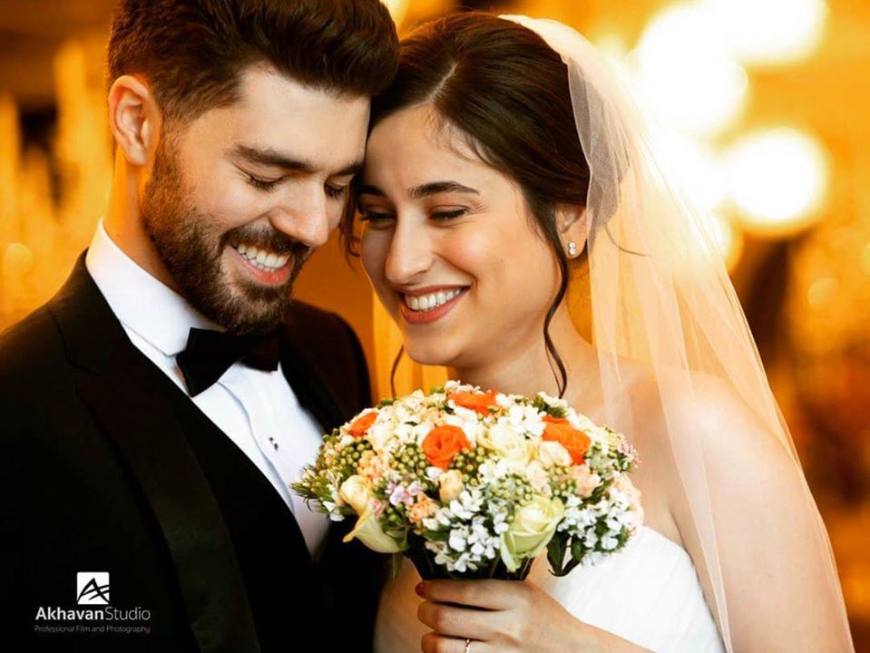 Arash Pourzarabi and Pouneh Gorji, seen here in their wedding photo.