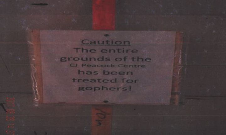 A photo of a sign that was posted at the CJ Peacock Centre in Cereal, Alta., after strychnine was applied in the area.