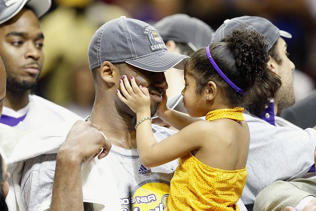 Los Angeles Lakers guard Kobe Bryant celebrates with his daughter Gianna following the Lakers’ 99-86 defeat of the Orlando Magic in Game 5 of the NBA Finals at Amway Arena in Orlando, Fla., on June 14, 2009. Both Bryant and his daughter died in a helicopter crash on Jan. 26, 2020.