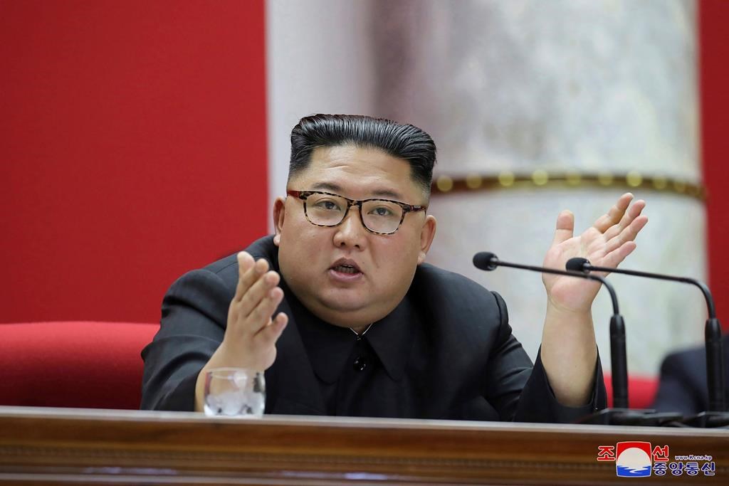 In this undated photo taken during the period of Dec. 28 - Dec. 31, 2019 provided by the North Korean government, North Korean leader Kim Jong Un attends a Workers’ Party meeting in Pyongyang, North Korea.