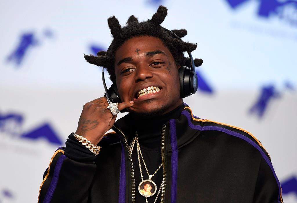In this Aug. 27, 2017 file photo, Kodak Black arrives at the MTV Video Music Awards at The Forum in Inglewood, Calif.