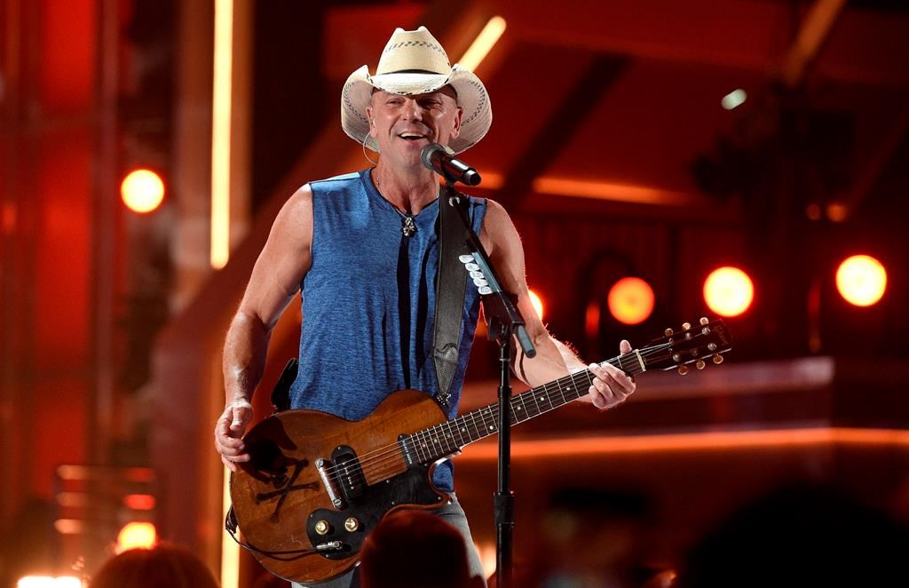 In this April 15, 2018, file photo, Kenny Chesney performs “Get Along” at the 53rd annual Academy of Country Music Awards at the MGM Grand Garden Arena on Sunday, in Las Vegas, Nev.