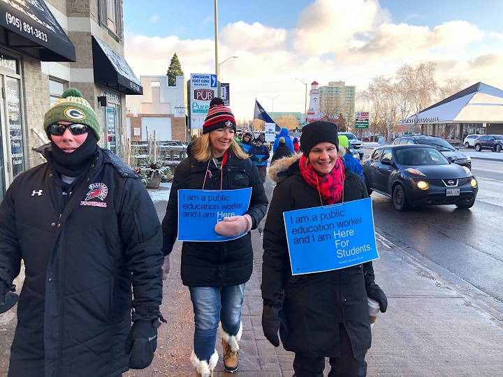 Ontario’s high school teachers and educational workers from eight school boards on strike for one day. Picketers strike in Mississauga.