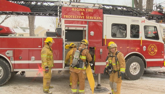 Regina firefighters on scene at a house fire.