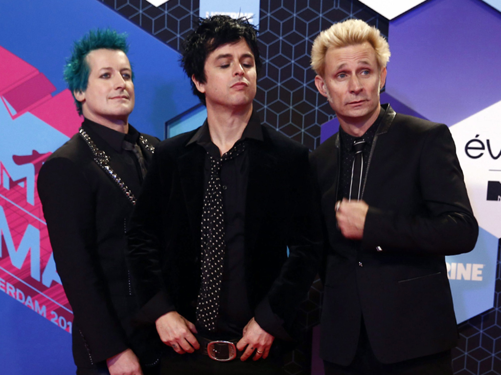 (L-R) Tré Cool, Billie Joe Armstrong and Mike Dirnt of Green Day pose for photographers upon arrival at the MTV European Music Awards 2016 in Rotterdam, Netherlands, on Sunday, Nov. 6, 2016.
