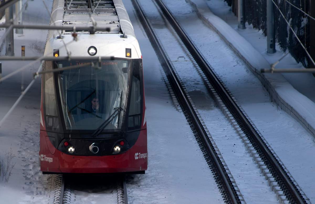 An OC Transpo light-rail train is seen heading out of downtown Ottawa, Tuesday, Jan. 21, 2020.
