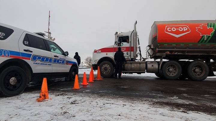 On Thursday, Regina police closed a portion of Ninth Avenue. Initially police were only allowing Co-op fuel trucks through but the road is now also open to pedestrians .