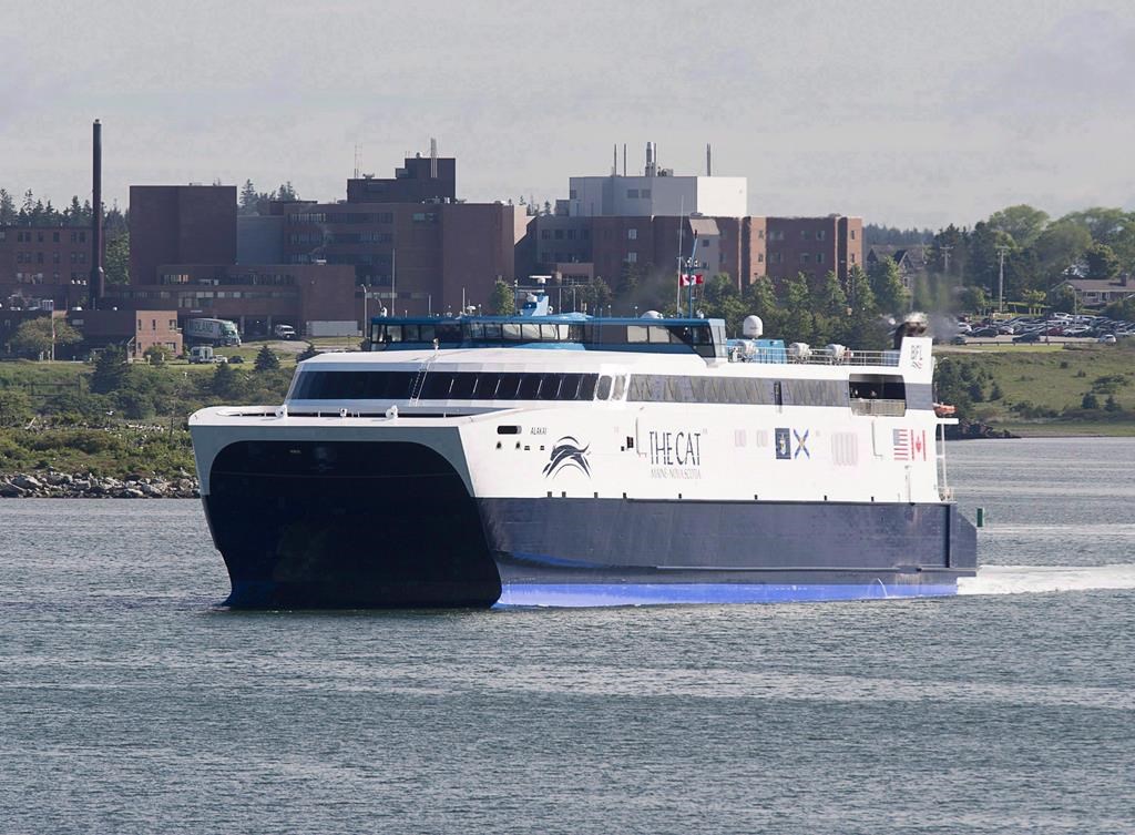 The CAT, a high-speed passenger ferry, departs Yarmouth, N.S., heading to Portland, Maine on its first scheduled trip on Wednesday, June 15, 2016.