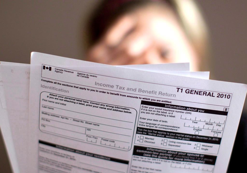 A tax return form is pictured in Toronto on Wednesday April 13, 2011.
