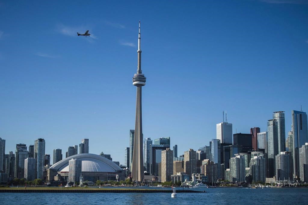 The Toronto skyline is photographed from the Hanlan's Point ferry as it travels back to the city on Thursday, June 21, 2018.