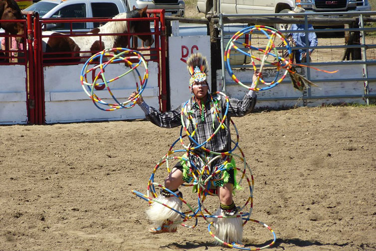 Alex Wells performing hoop dance.