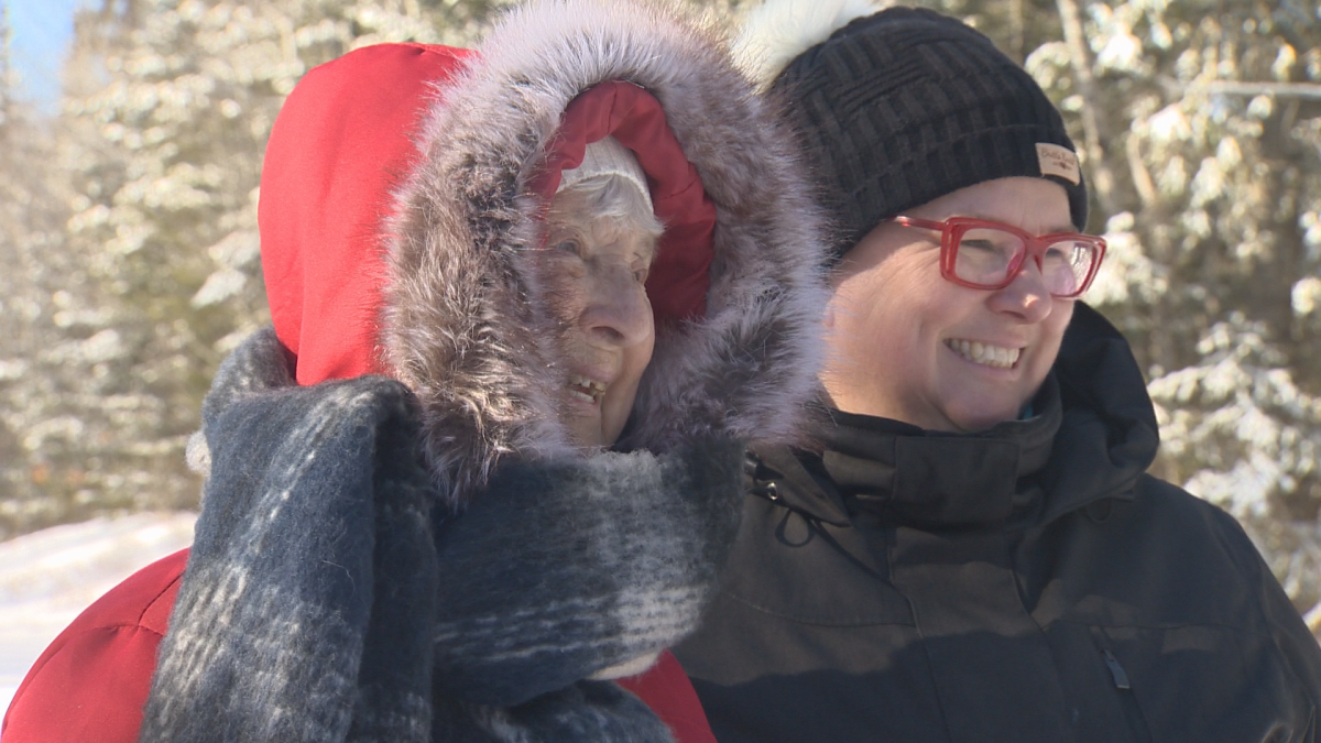 Elizabeth Baillie, 81, (left) and her daughter Cathy, prior to going on a dog sledding trek