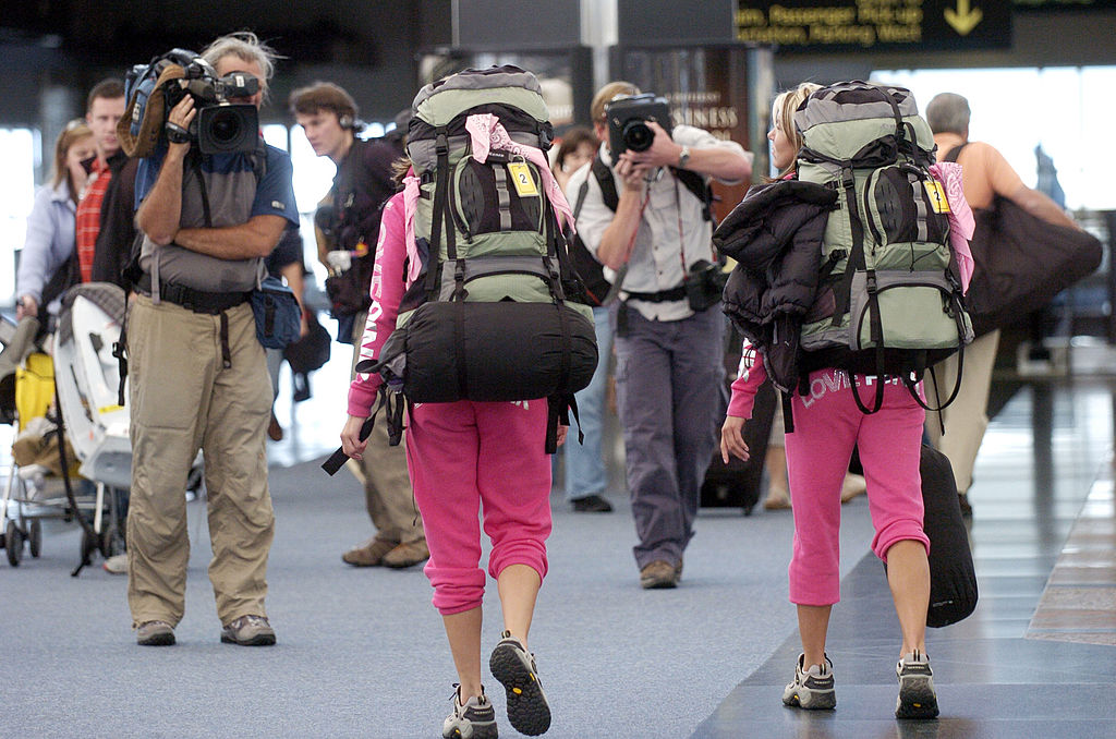 A couple participating in 'The Amazing Race' is caught on camera in the Denver airport.