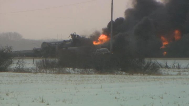 Flames and thick smoke from the scene of a CP train derailment near Guernsey, Sask., on Thursday, Feb. 6, 2020.