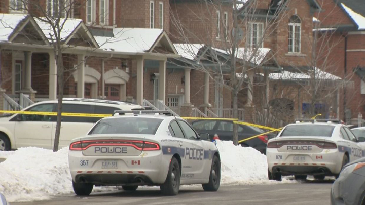 Police at the scene of the stabbing on Sunday.
