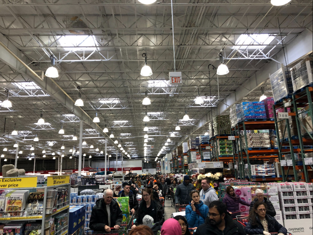 A Costco location in Ajax, Ont., was full of customers, with lines stretching almost the entire length of the store.