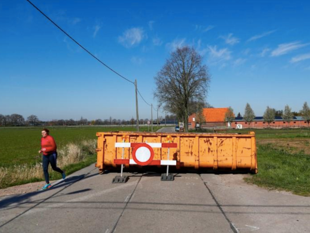 A container is pictured in a street on the Dutch-Belgian border during the coronavirus lockdown imposed by the Belgian government in an attempt to slow down the coronavirus disease (COVID-19) spread, near Hoogstraten, Belgium March 25, 2020.
