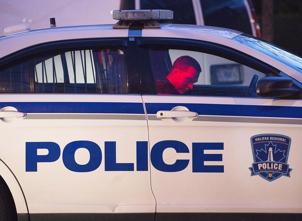 Halifax Regional Police attend a crime scene in north end Halifax on Tuesday, May 17, 2016.