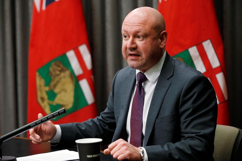 Dr. Brent Roussin, Manitoba chief public health officer, speaks during the province's latest COVID-19 update at the Manitoba legislature in Winnipeg Wednesday, March 25, 2020. THE CANADIAN PRESS/John Woods.