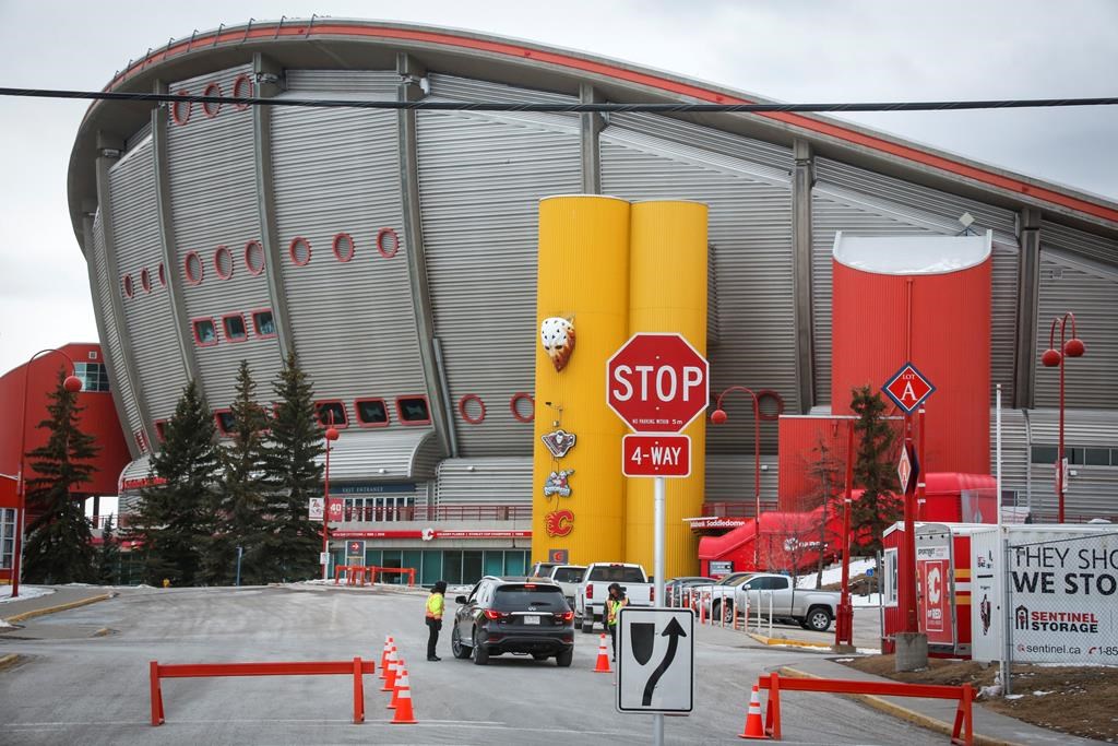 The Saddledome, home of the Calgary Flames, is seen in Calgary, Thursday, March 12, 2020. The NHL has suspended the 2019-20 season due to the COVID-19 pandemic.