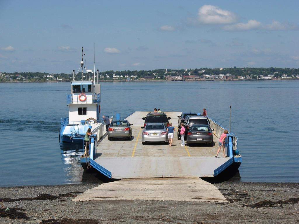 Passengers board a car ferry for the short trip from Campobello Island, N.B., to nearby Deer Island, N.B., on Aug 1, 2009.