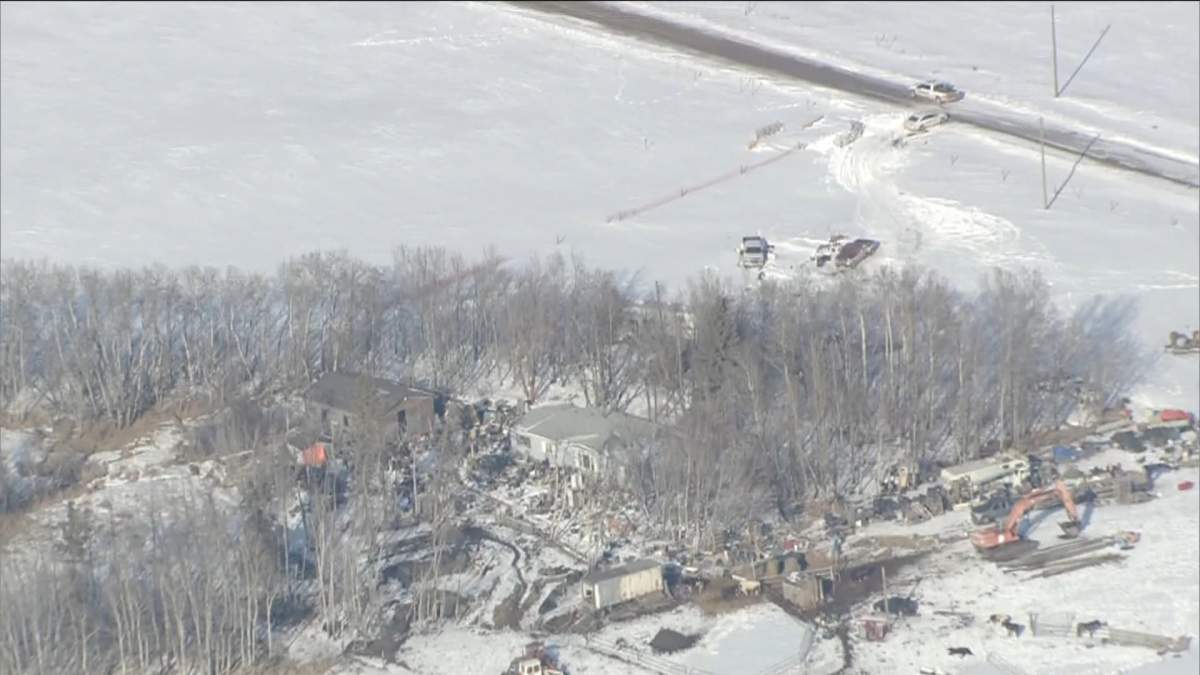 Olds RCMP investigate at a shooting near Township Road 320 and Range Road 290 on March 20, 2020.