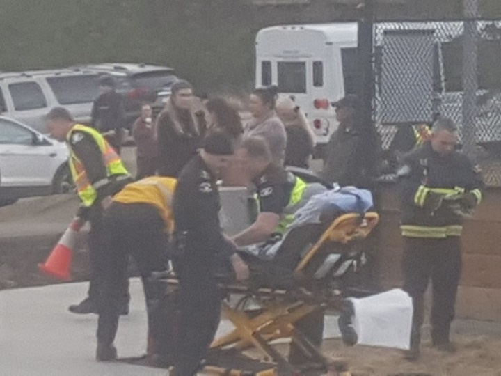 The boy was placed onto a stretcher after being freed.