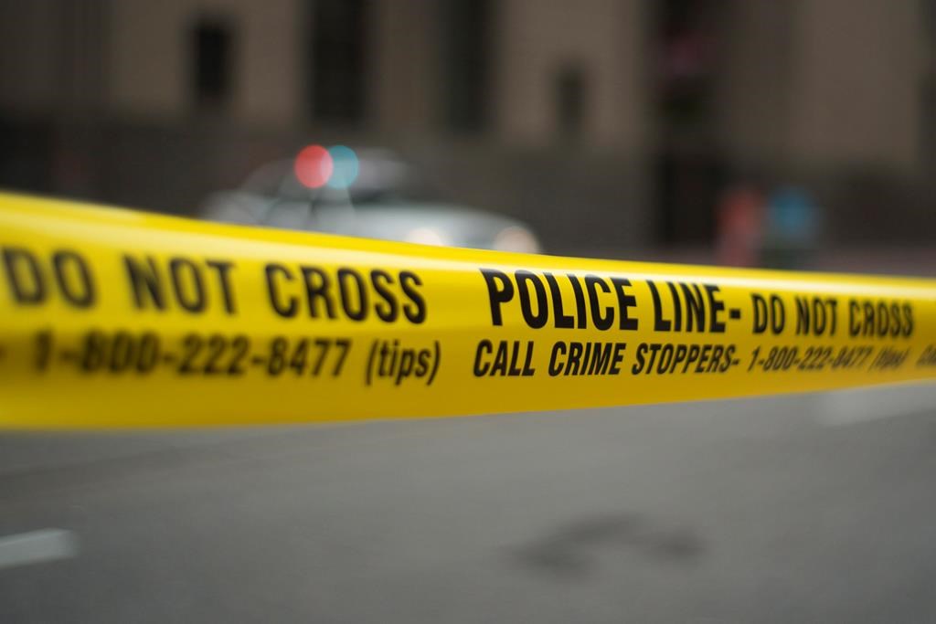 Police tape is shown in Toronto, Tuesday, May 2, 2107. THE CANADIAN PRESS/Graeme Roy.
