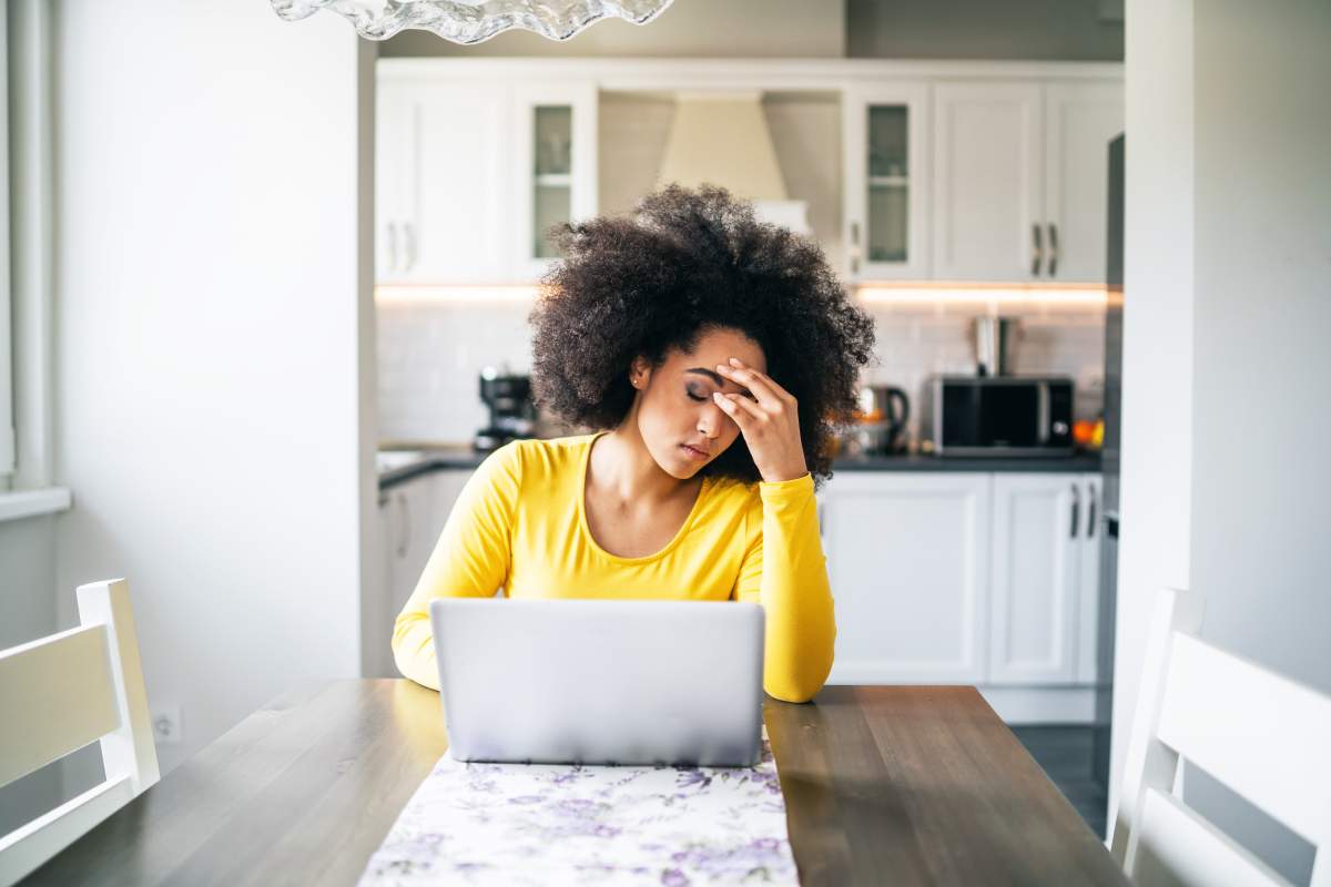Depressed woman at home.