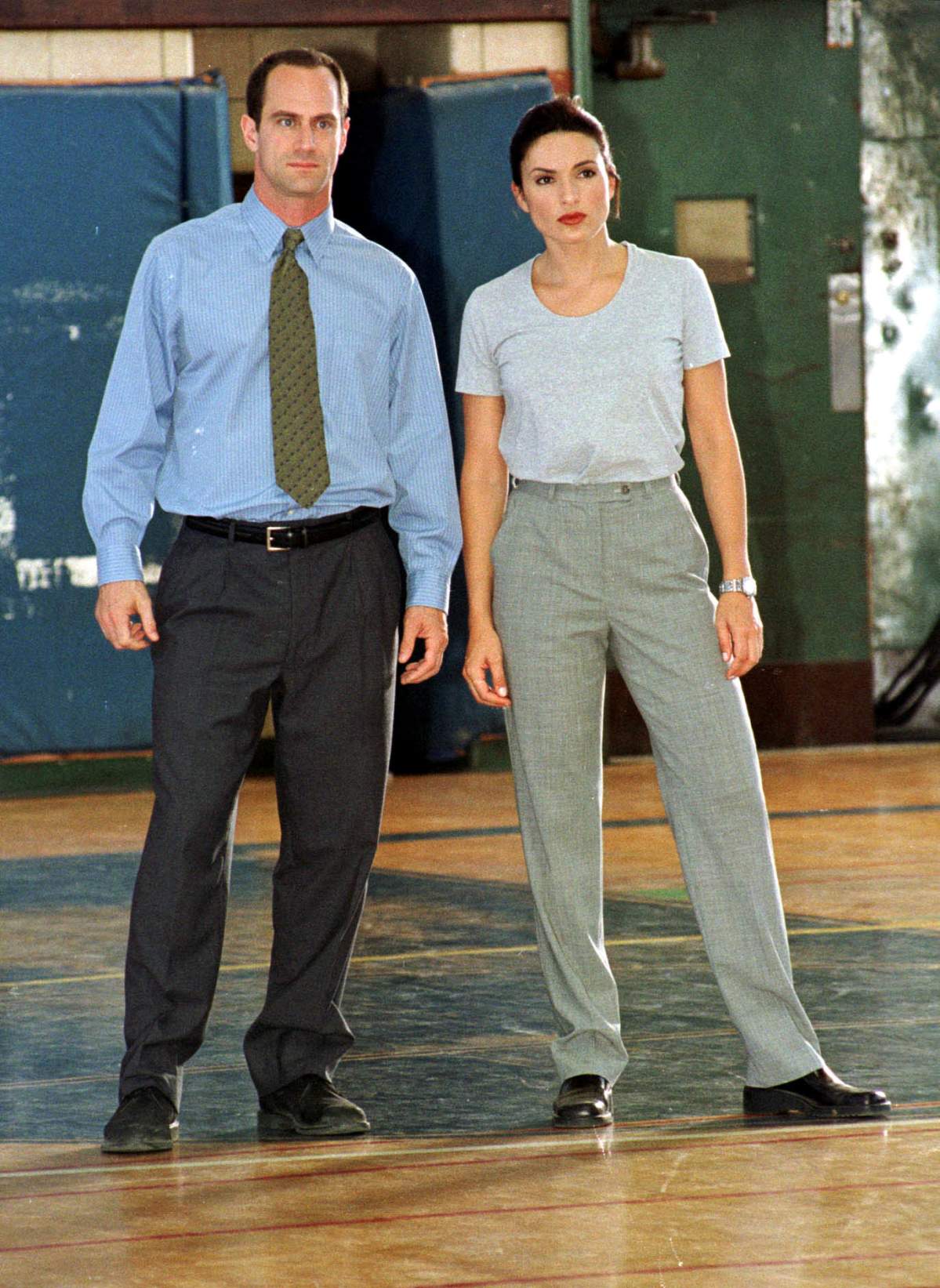 Chris Meloni and Mariska Hargaity wait for filming of the newest Spinoff Law and Order: Special victims Unit, to resume at their location in the old gym at Lehman College in The Bronx on Monday August 2, 1999. (Photo by Jason Green)