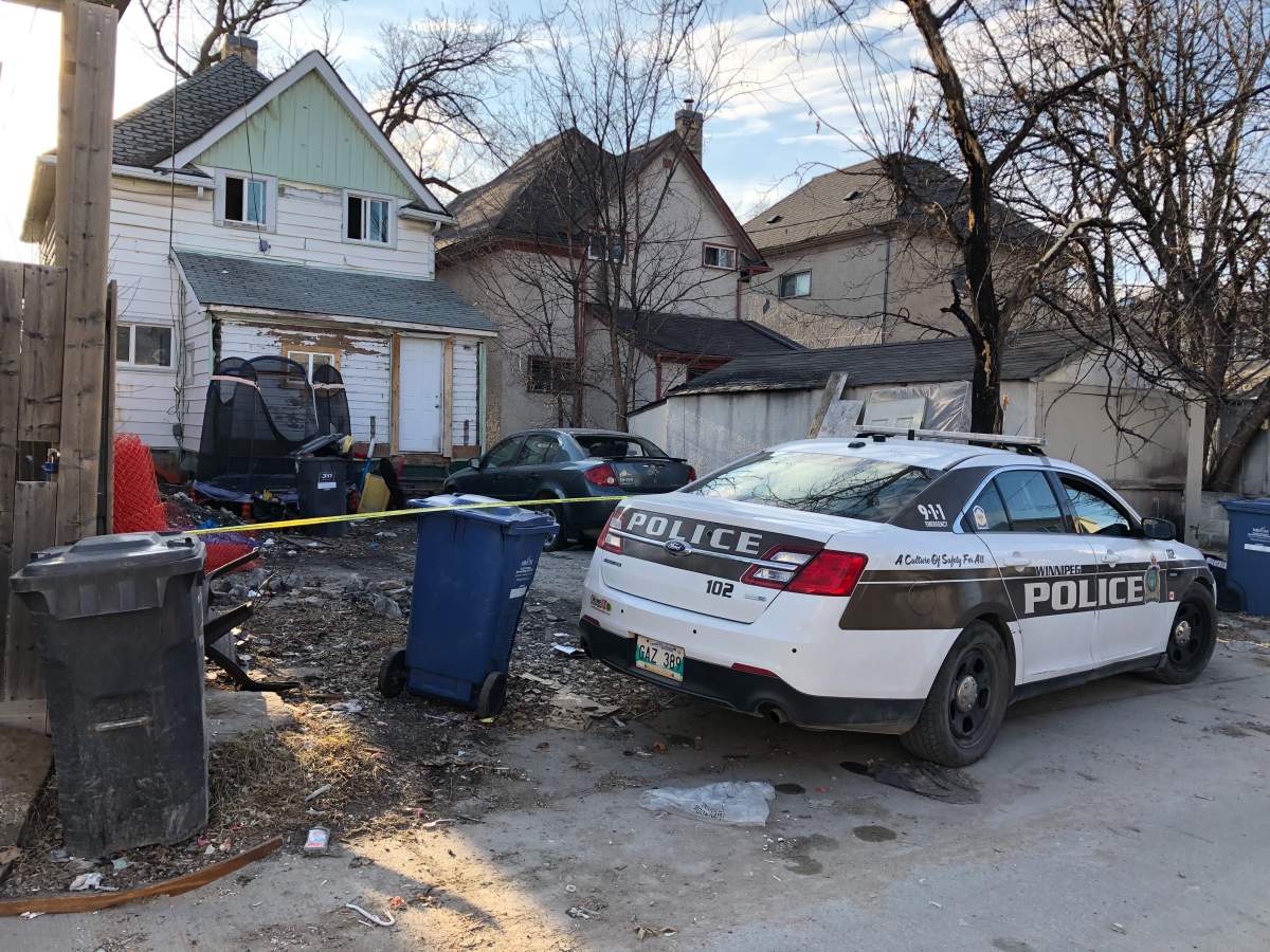 Police tape surrounds a Victor Street home where Noah Soloman Nigussie. 23, was shot and killed in April. Police now say an arrest has been made in the case.