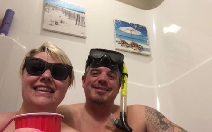 “I don’t know if outside … of self-isolation, we would have sat for hours and played games,” said newlywed Amanda Watson, left, with husband Billy in Lloydminster, Alta., on her birthday April 4, 2020.