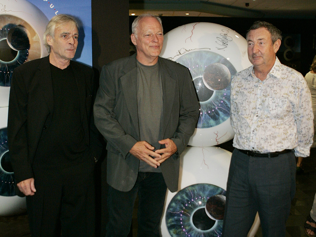 Members of Pink Floyd: David Gilmour, center, Nick Mason, right, and the late Rick Wright, left, arrive for the screening of the group’s new DVD at a cinema in central London’s Leicester Square, on Monday, July 3, 2006.