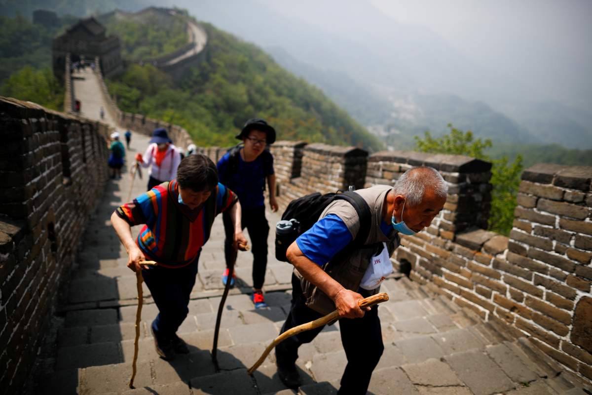 Tourists visit the Mutianyu section of the Great Wall of China on the first day of the five-day Labour Day holiday following the coronavirus disease (COVID-19) outbreak, on the outskirts of Beijing, China May 1, 2020.
