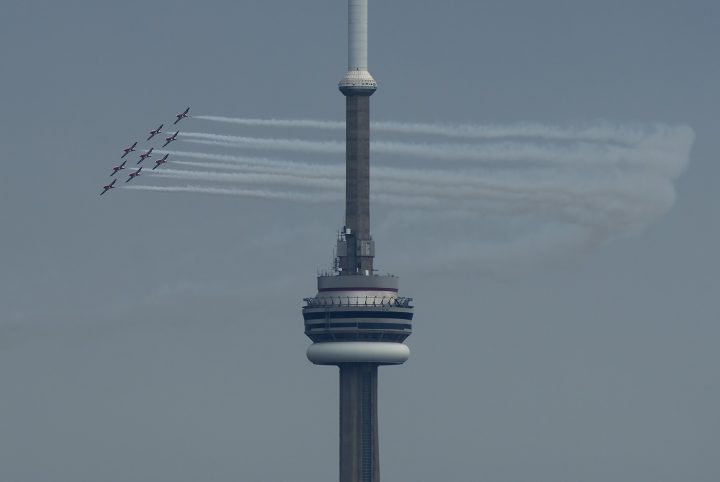 The Canadian Snowbirds circle the CN Tower as part of Operation Inspiration during the COVID-19 pandemic in Toronto on Sunday, May 10, 2020.