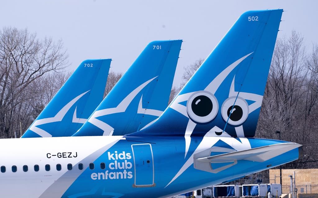 Air Transat aircrafts are seen on the tarmac at Montreal-Trudeau International Airport in Montreal, on Wednesday, April 8, 2020.