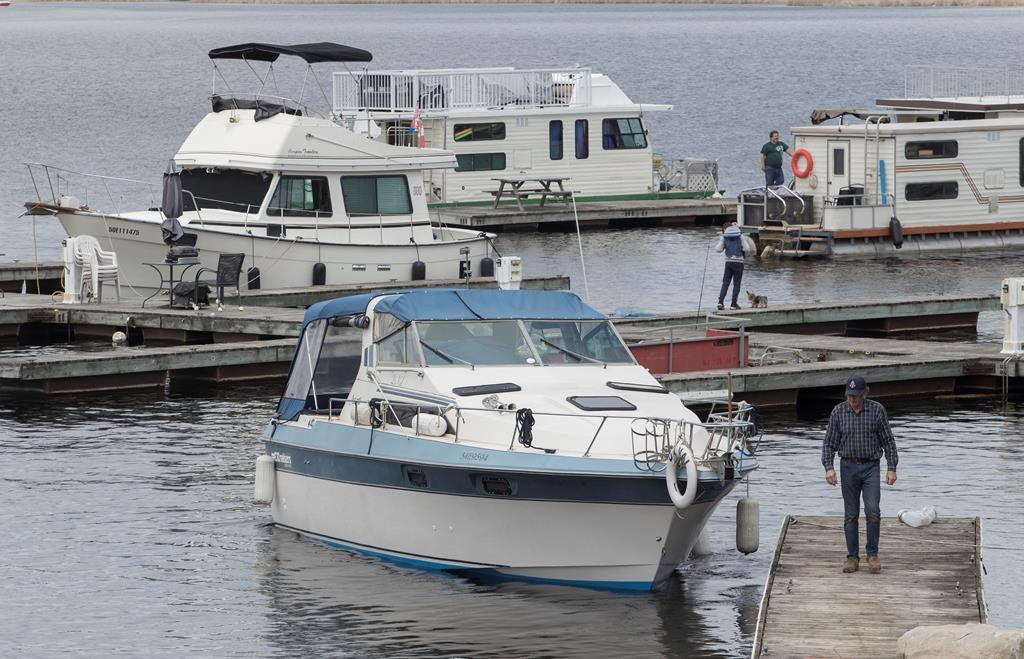 Boats get launched at Kawartha Lakes Marina in Bobcaygeon, Ont., on Saturday, May 16, 2020.