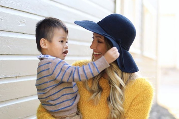 Myka Stauffer, right, is shown with Huxley, a child whom she adopted from China in 2017.