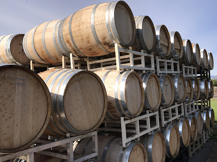 Wine barrels at Deep Roots Winery in Naramata, B.C. Wineries across the Okanagan are reopening their doors for taste testing after the province of B.C. rescinded a closure order last week that was first issued on March 17.