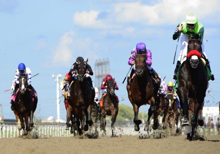 One Bad Boy, right, ridden by jockey Flavien Prat, runs the 160th Queen's Plate at Woodbine Racetrack, in Toronto on Saturday, June 29, 2019.