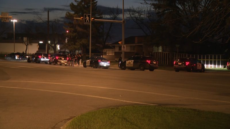 Calgary police investigate a shooting in the 5500 block of Centre Street North on Friday, May 15, 2020.