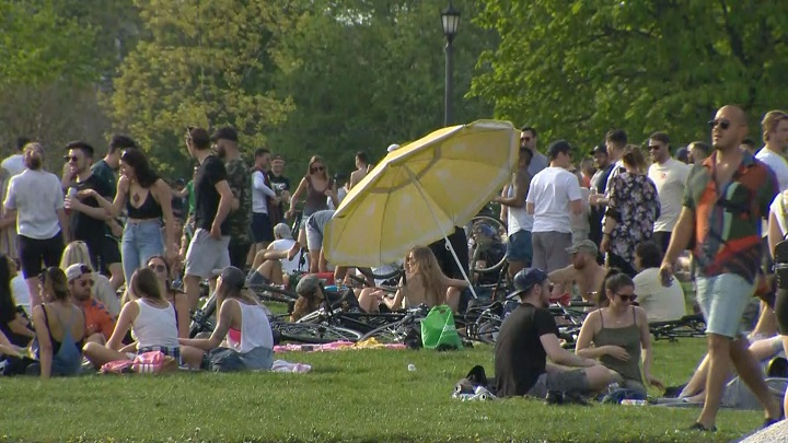 Crowds gather at Trinity Bellwoods Park in Toronto on Saturday, May 23, 2020.