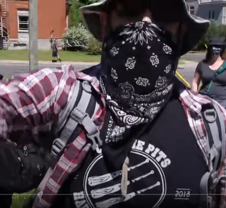 Kingston police are looking for this man, who allegedly pushed a Rebel Media reporter at a Kingston protest last weekend.