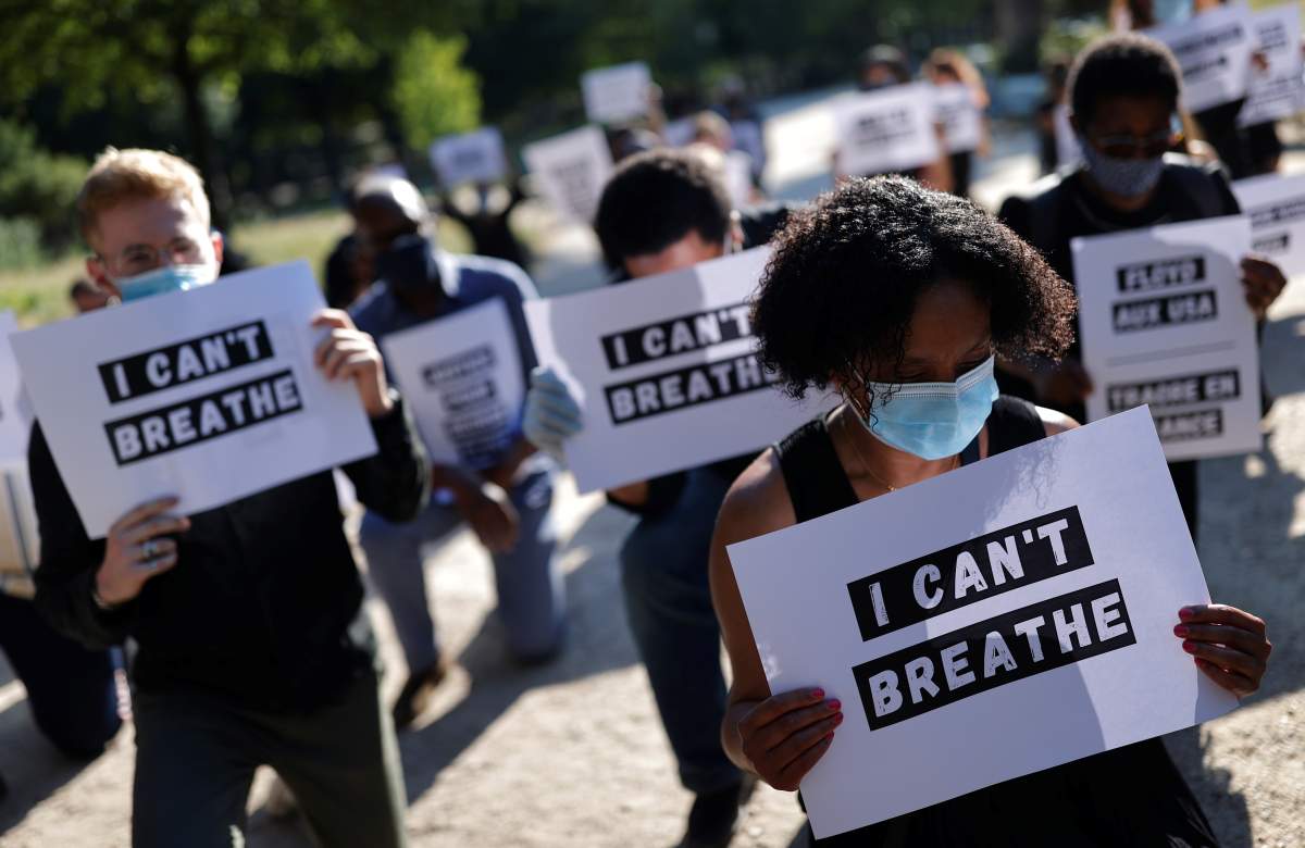 People protest against the death in Minneapolis police custody of George Floyd, next to the U.S. embassy in Paris, France, June 1, 2020.