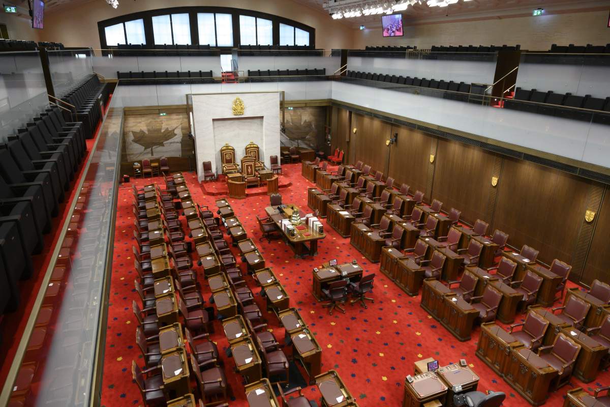 The Senate of Canada building and Senate Chamber are pictured in Ottawa on Monday, Feb. 18, 2019. The Senate's ethics officer says Conservative Sen. Victor Oh breached the upper house's ethics code four times when he accepted an all-expenses paid trip to China in 2017. 