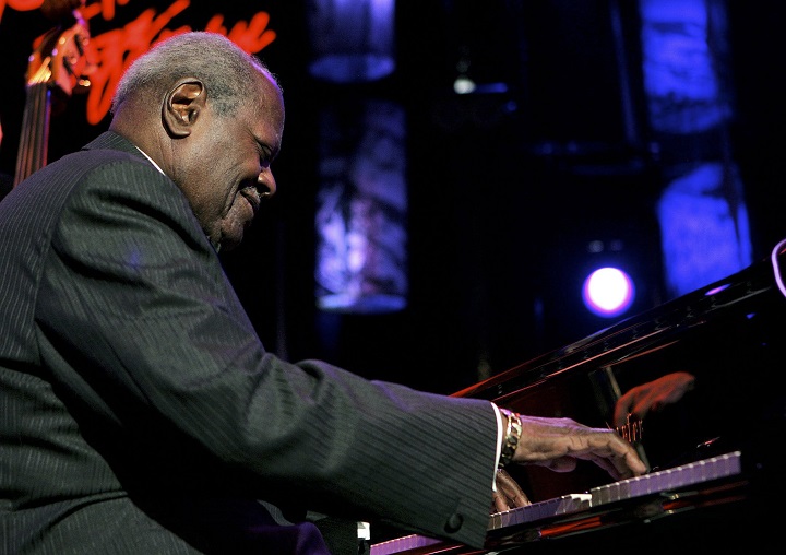 In this July 2005 file photo, Canadian jazz legend Oscar Peterson performs on the Stravinski hall stage during the 39th Montreux Jazz Festival in Montreux, Switzerland.