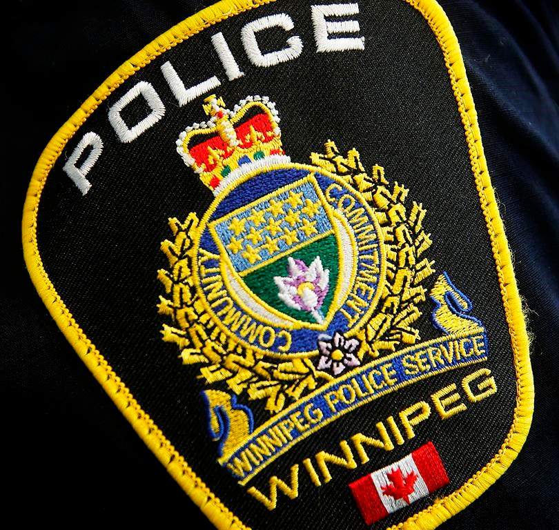 Photo of a Winnipeg Police Service shoulder badge on an officer.